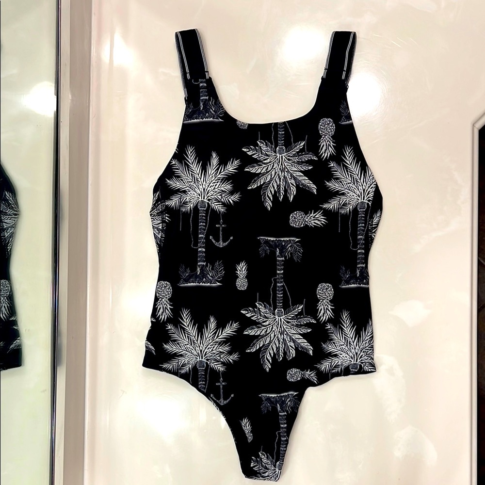 Hurley Black and White One Piece Swimsuit with Tropical Pattern